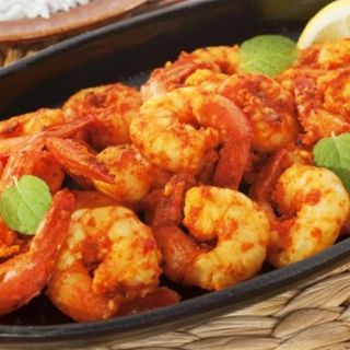 Tikka de langostinos Al ajo