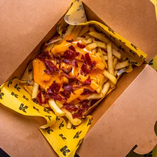 Patatas cheddar y bacon