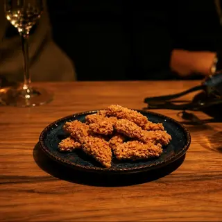 Tiras de pollo rebozado.