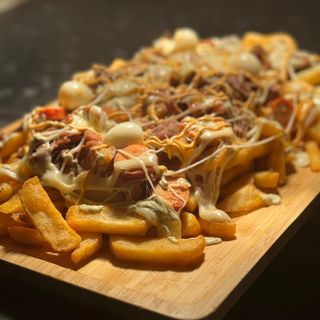 Salchipapa Raíces (Individual)