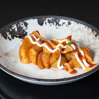75. Patatas bravas