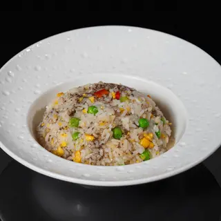 21. Arroz frito con trufa negra y verduras