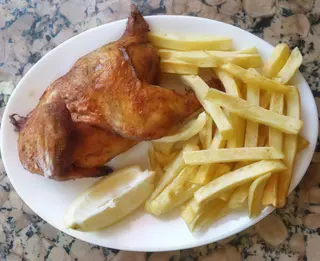1/2 Pollo al horno con patatas