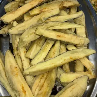 Berenjenas fritas con miel ( opcional )