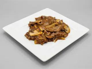 Ternera con champiñones