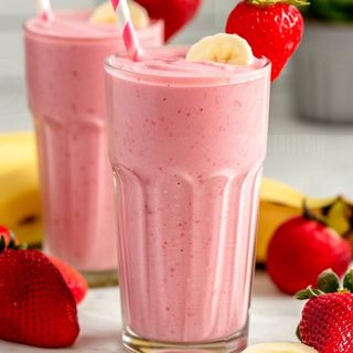 Smoothie naranja, fresa y plátano