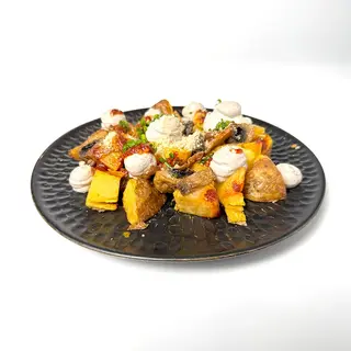 Bravas setas y trufa
