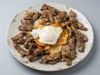 Taquitos de añojo al ajillo