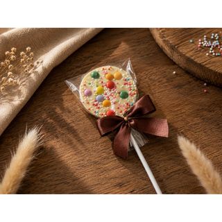 Piruleta de Chocolate Multicolor · aprox. 6 meses · aprox. 25 g · Chocolate blanco