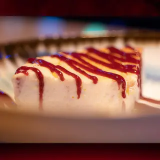 Tarta de queso con fresa (porción)