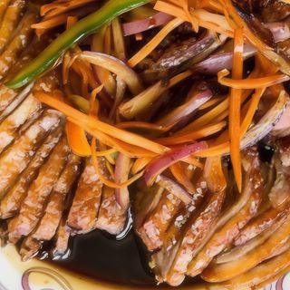 Pato con salsa picante 