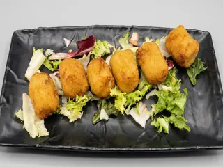 Croquetas de parmesano y bacón