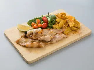 Secreto ibérico con patatas y pisto manchego