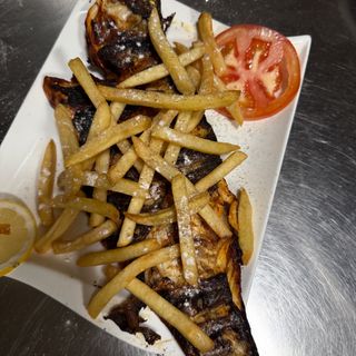 Fish grill dorada.( Pescado Dorada a La Brasa).