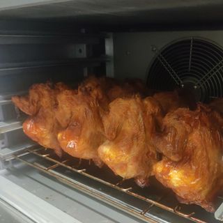 Pollo asado entero con patatas