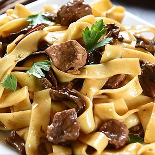 Papardelle al ragù di funghi e panceta fresca