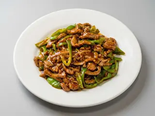 T6 - Ternera con pimientos verdes