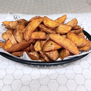 Ración de patatas gajos