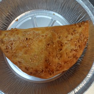 Empanadilla de pollo y bechamel