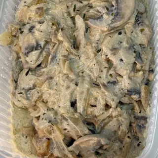 Solomillo de cerdo con salsa de champiñones y queso azul