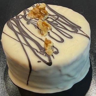 Alfajor XL de Nuez bañado en Chocolate Blanco