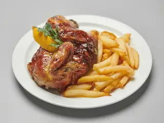 Medio pollo con patatas