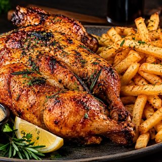 Pollo Al Ast Entero con fritas