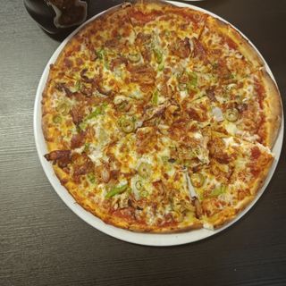 Pizza de pollo o ternera
