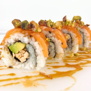 Salmón cocido,salsa teriyaki y pistacho