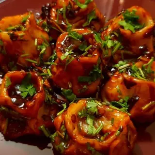 CHILLI GARLIC MOMOS