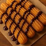 1/2 kilo Xurros amb xocolata (topping)