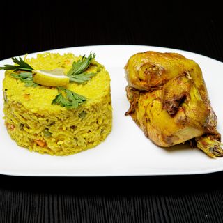 Medio pollo Y Arroz con verdura