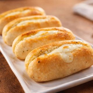 Pan de ajo con mozzarella y jamon