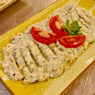 Berenjena asada a fuego de leña