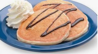 Tortita con nata y sirope a elegir