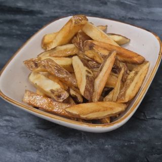 Patatas Fritas con un Condimento Especial