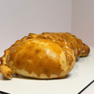 Empanada Exquisita de 4 tipos de queso.