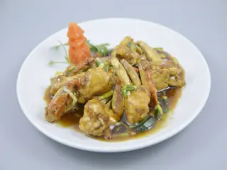 89. Cangrejo chino con cebolleta y jengibre