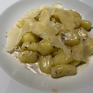 Rigatoni, crema de trufa, bolets i beicon