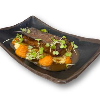 Xai a la brasa (costelles i mitjanes)