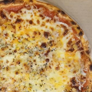 Pizza Clásica mediana al gusto