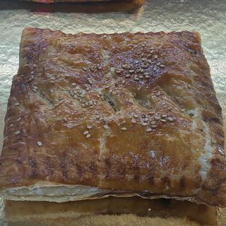 Empanadilla de Pollo y Champiñones con Bechamel