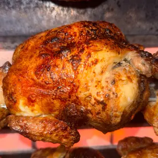 Medio pollo con patatas