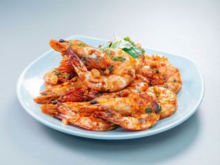 Langostinos al estilo Chino servidos en plancha caliente