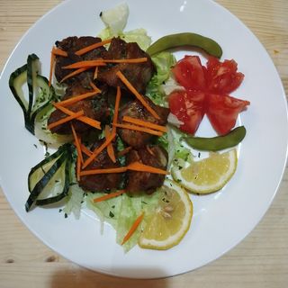 Costillas de cerdo al horno con pimientas
