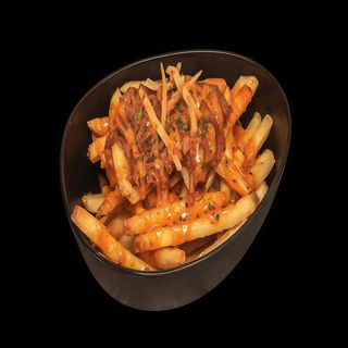 Patatas con cheddar y bacon