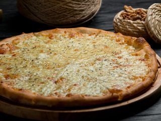 69. PIZZA 4 QUESOS