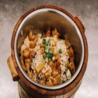 Arroz cocido en barril