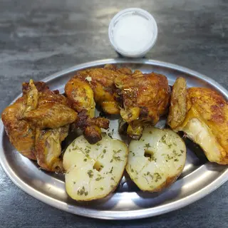 Pollo a l ast con patats caliu y all i oli