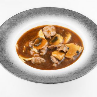Ternera con bambú y setas